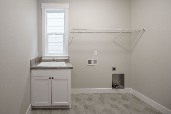 Drop-In Utility Sink with 30' Wide Cabinet and Tile Deck